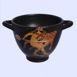 Classical Red-figure skyphos depicting a Satyr and a Muse 1